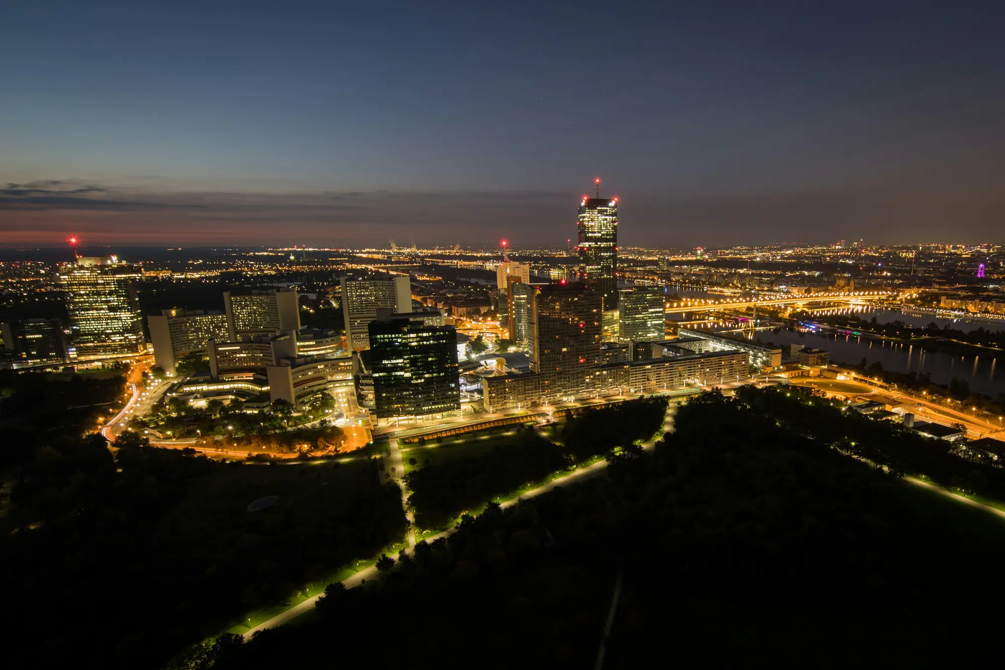 Vienna at blue hour from above, the city lights coming on